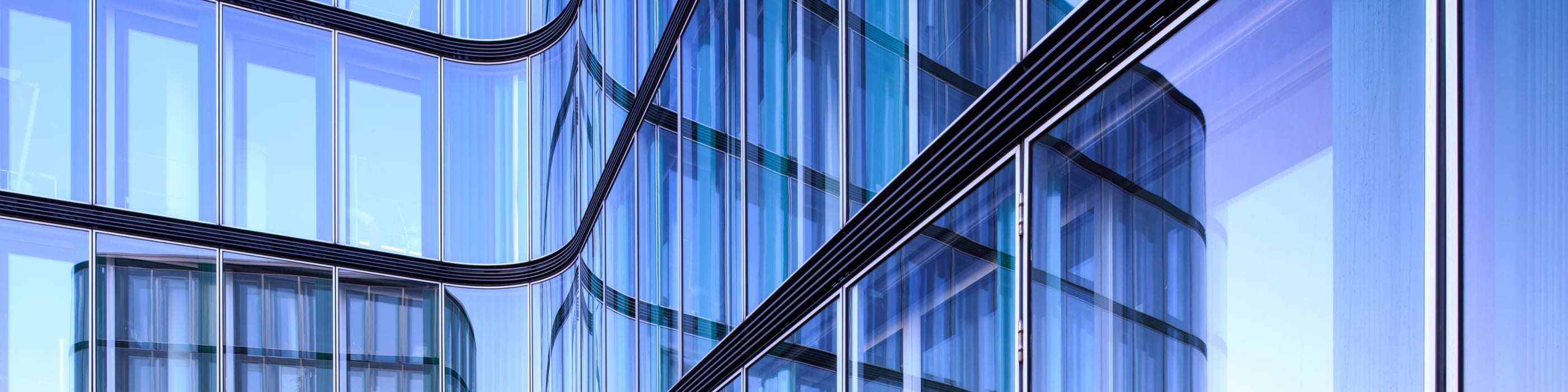 Title input field for an image of modern glass buildings with reflections, used as a tooltip on hover.
