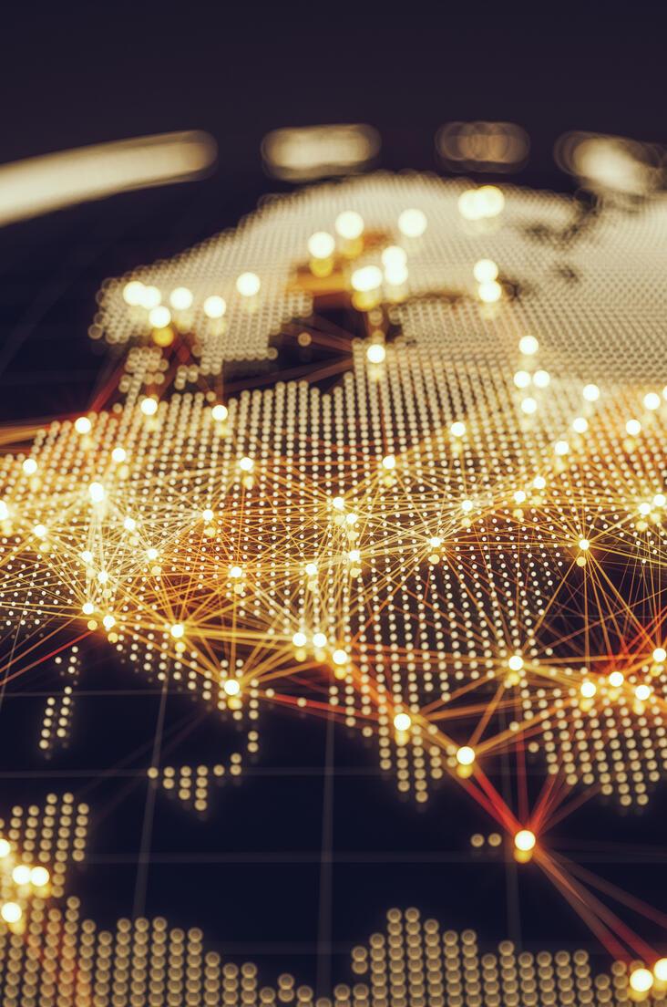 Abstract visual of a world map with illuminated network connections