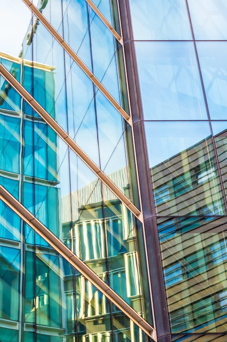 Skyscrapers reflected in the window