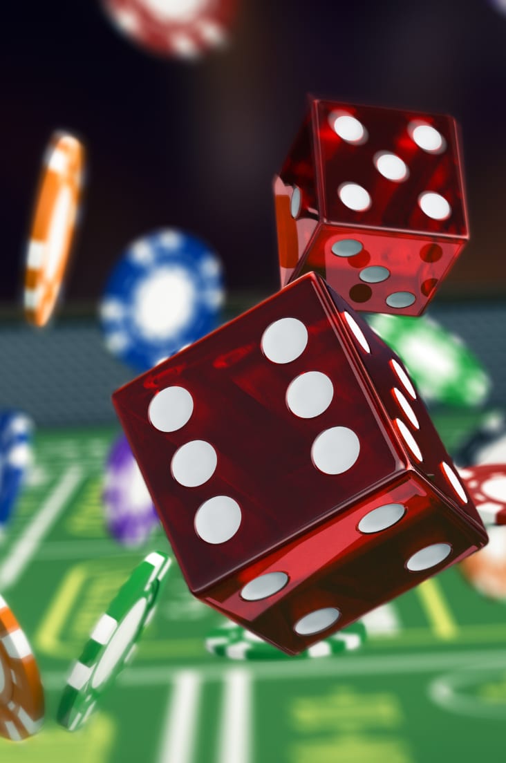 Chips and dices thrown on a casino table
