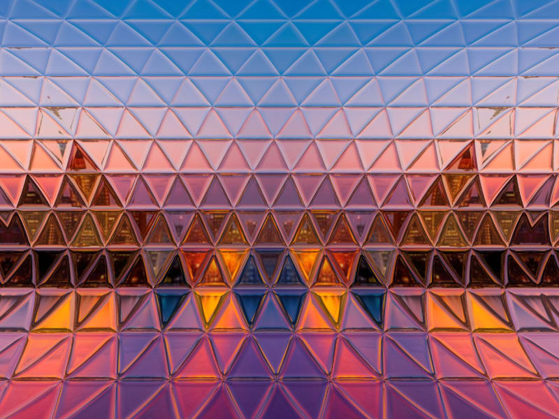 Distorted city reflection in a window