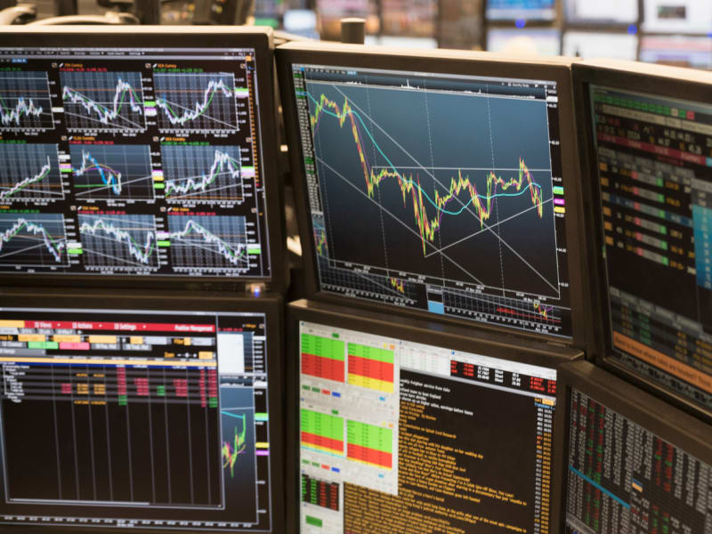 Monitors with stock market graphs