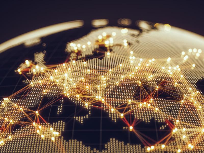 Abstract visual of a world map with illuminated network connections