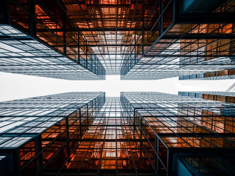 Two glass buildings facing each other