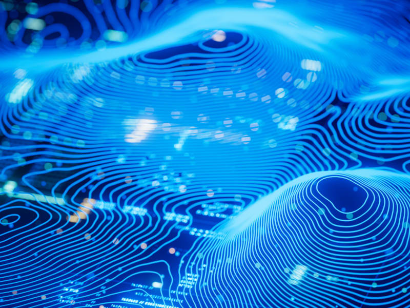 A blue, semi-transparent hypsometric map superimposed on the screen
