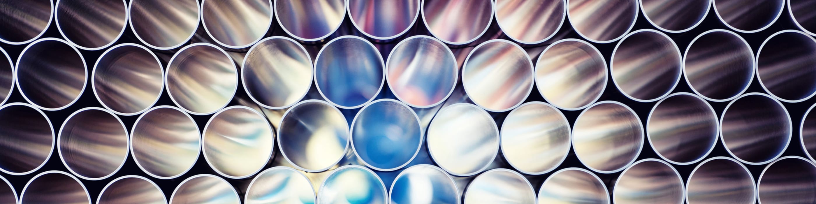 Sunlight shining through the insides of pipes