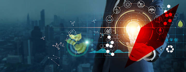 A suited man holds a shining lightbulb circled by icons representing different energy sources