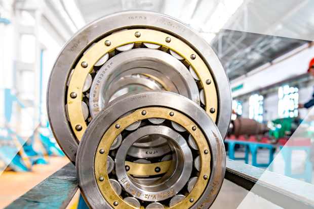 Person measuring a bearing
