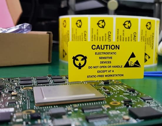 A warning sign of an electrostatic sensitive device next to an electronic component