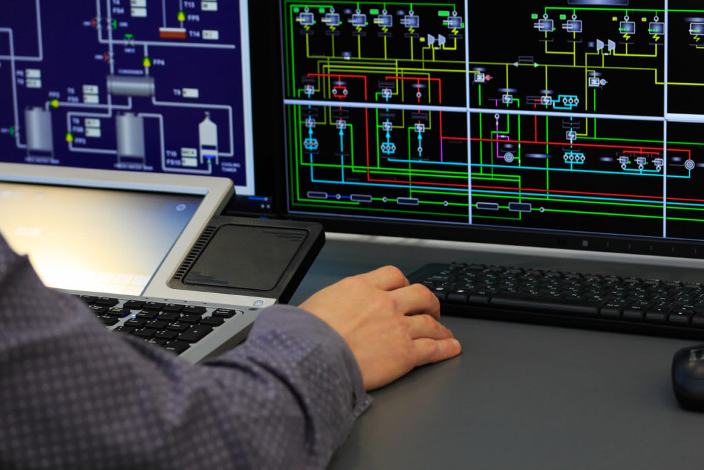 A man checking system on computer