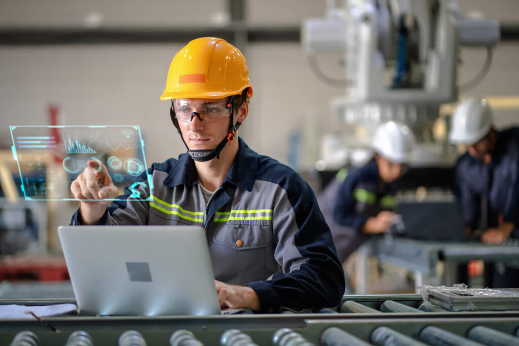 A factory worker being digitally secure
