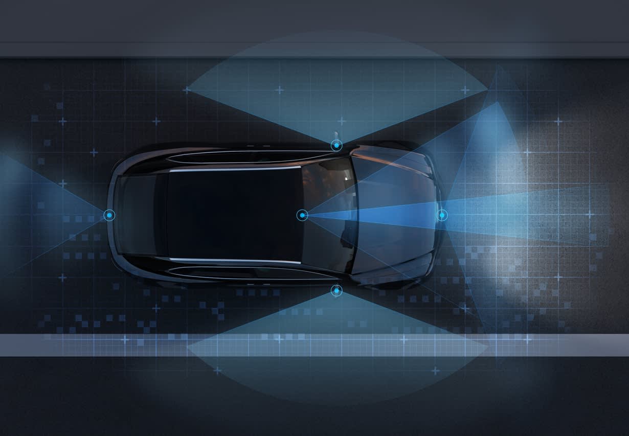 Top-down view of a car demonstrating LiDAR sensor coverage with blue light beams scanning the road