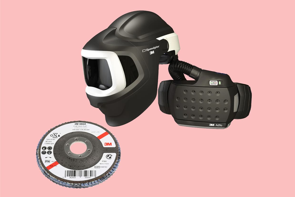 3M Helmet and disc on pink background