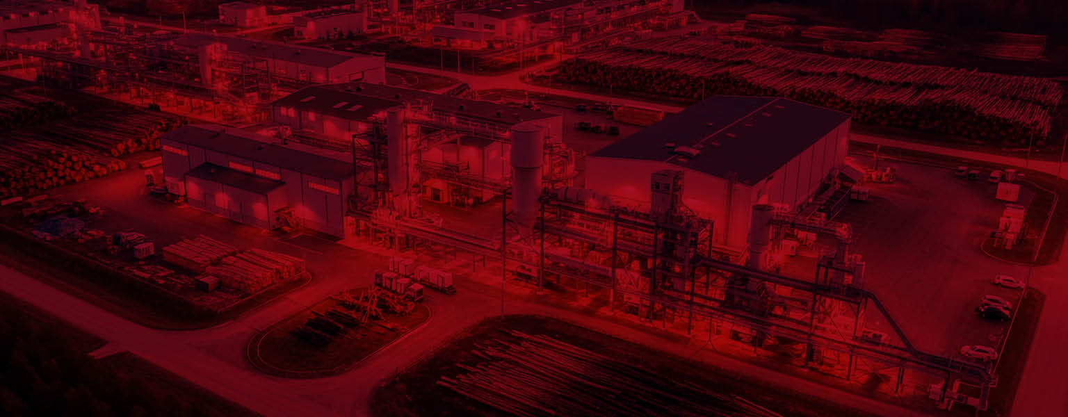 A wide shot of a warehouse operating at night