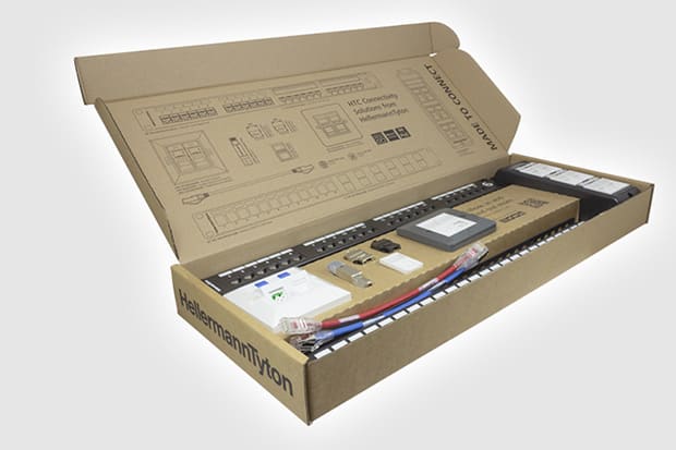 Cardboard box with various sample items inside