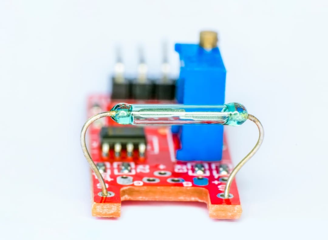Image of a reed switch installed in a simple circuit board
