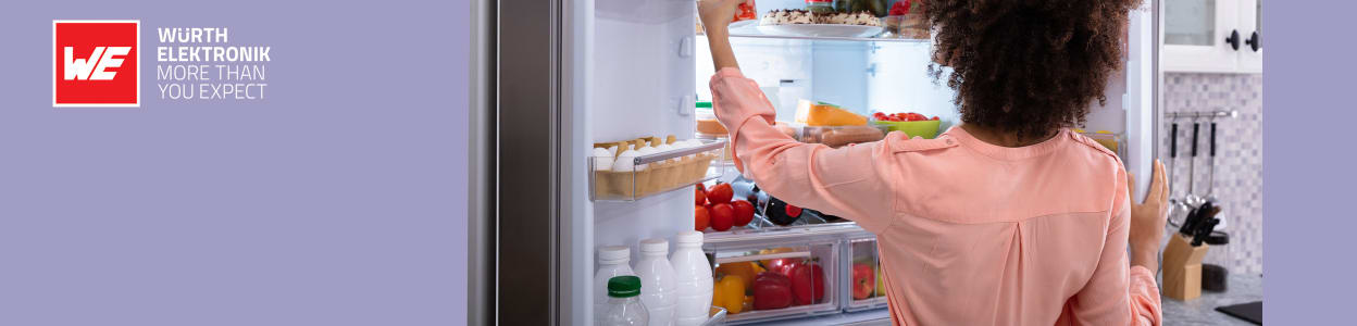 woman taking food from refrigerator
