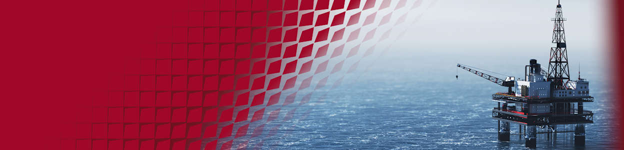 An operating oil rig in the centre of an ocean.