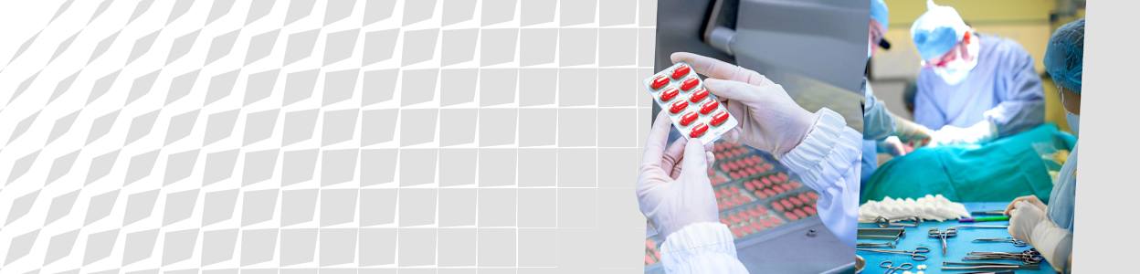 Image of a surgery room with different tools and a doctor in disposable gloves holding red tablets