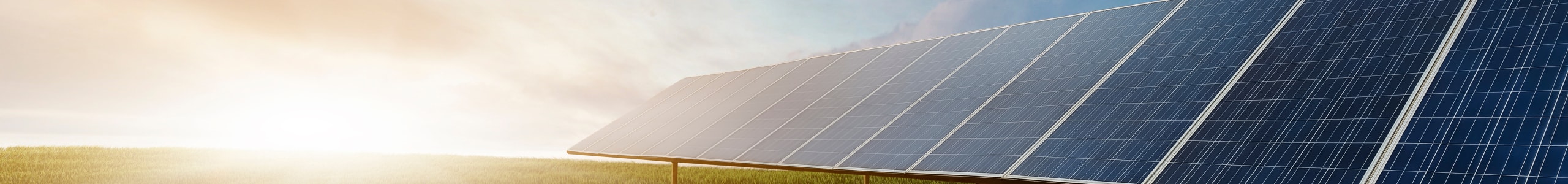 Man walking on roof with solar panels