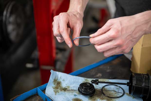 Persons hands holding a Gasket & Seal