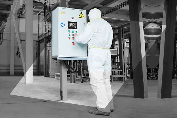 Person in white work wear.