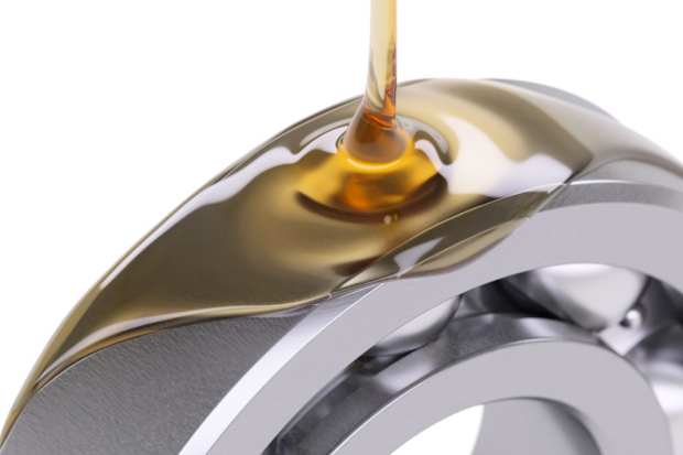  Lubrication being poured onto equipment 