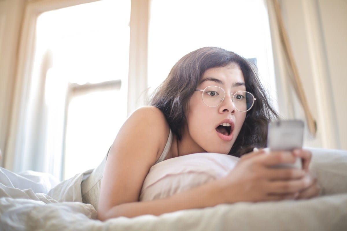 girl surprised on phone