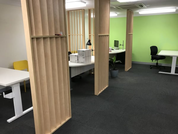 Sheltered cubicle permanent desks
