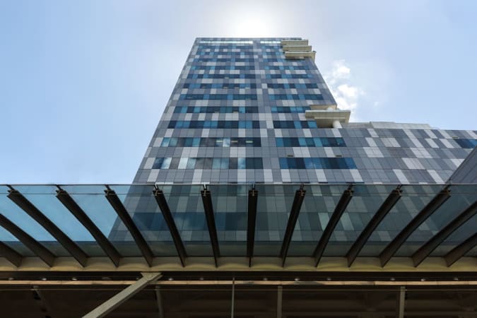 Sleek, modern facade of Fusionopolis Place—dynamic workspace in the heart of Singapore.