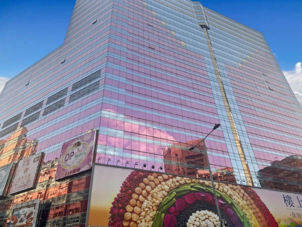 Modern flexible workspace at Nathan Road, featuring vibrant, reflective exterior.