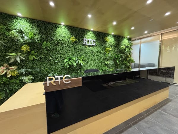 Welcome to our vibrant coworking hub in Kwun Tong. Lush greenery and sleek design await!