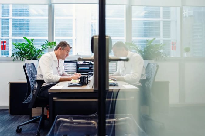 Bright, private workspace with modern furnishings and ample natural light in Singapore.