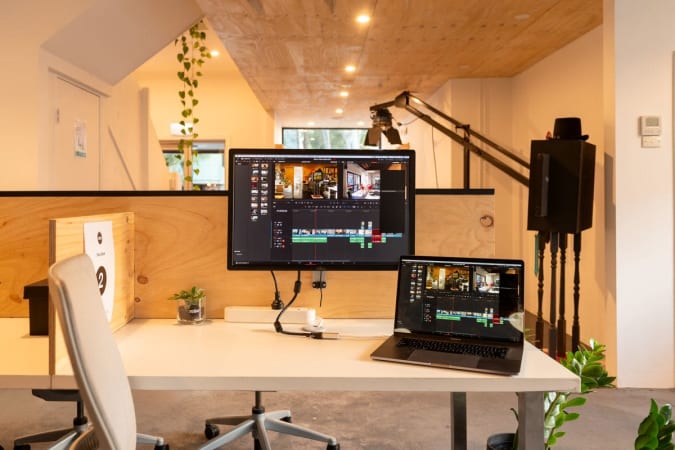 Each club member desk comes with a monitor to plug your laptop into via HDMI