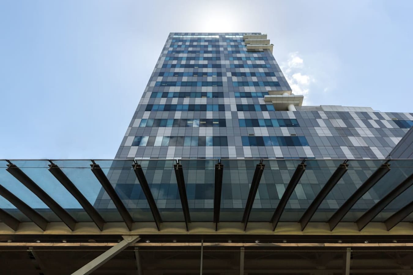 Sleek, modern facade of Fusionopolis Place—dynamic workspace in the heart of Singapore.