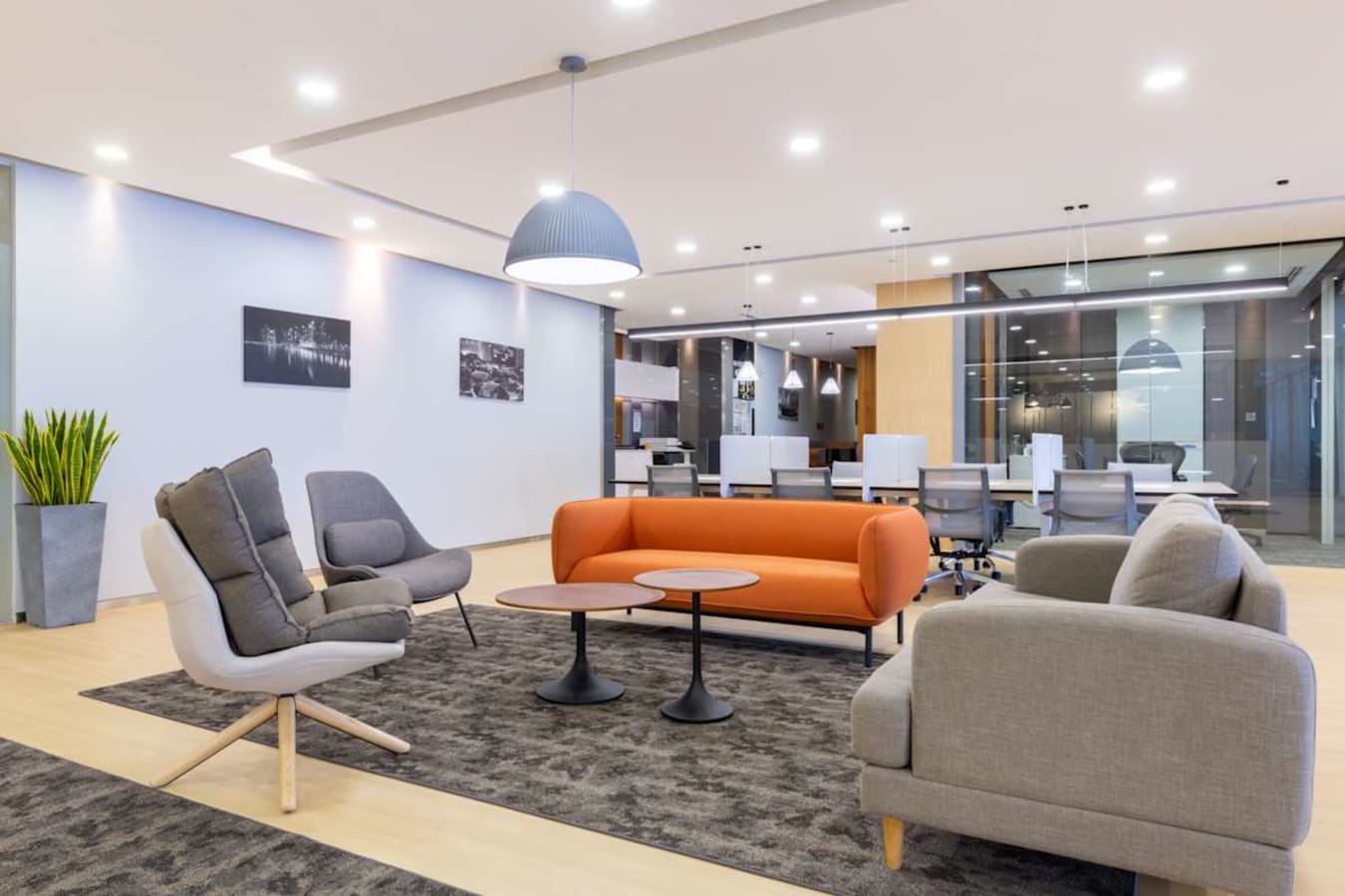 Bright, modern coworking space with stylish seating and ample natural light in Marina Boulevard.