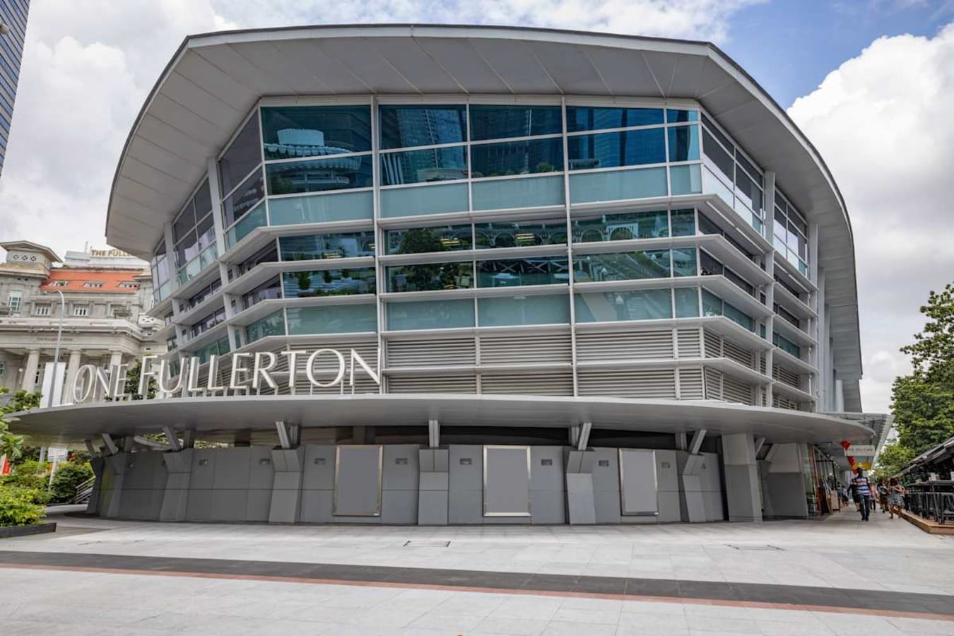 Modern coworking space at One Fullerton, featuring a sleek exterior and prime Singapore location.