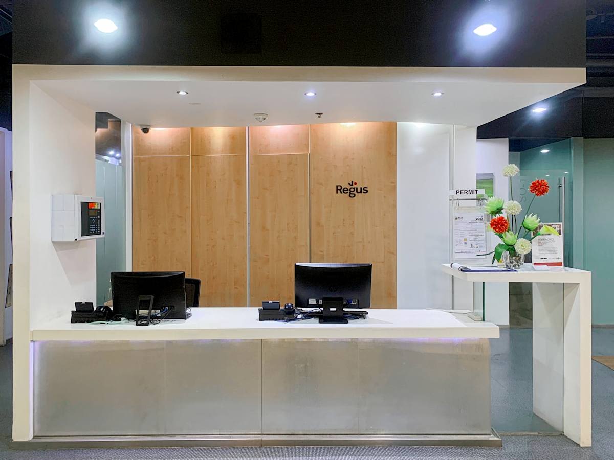 Modern reception with sleek design in a flexible coworking space on Filinvest Avenue.