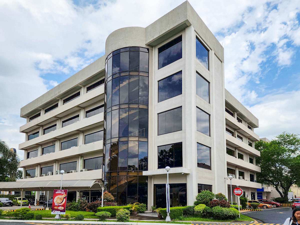 Modern coworking space with sleek architecture on Jose Abad Santos Avenue, ideal for productivity.