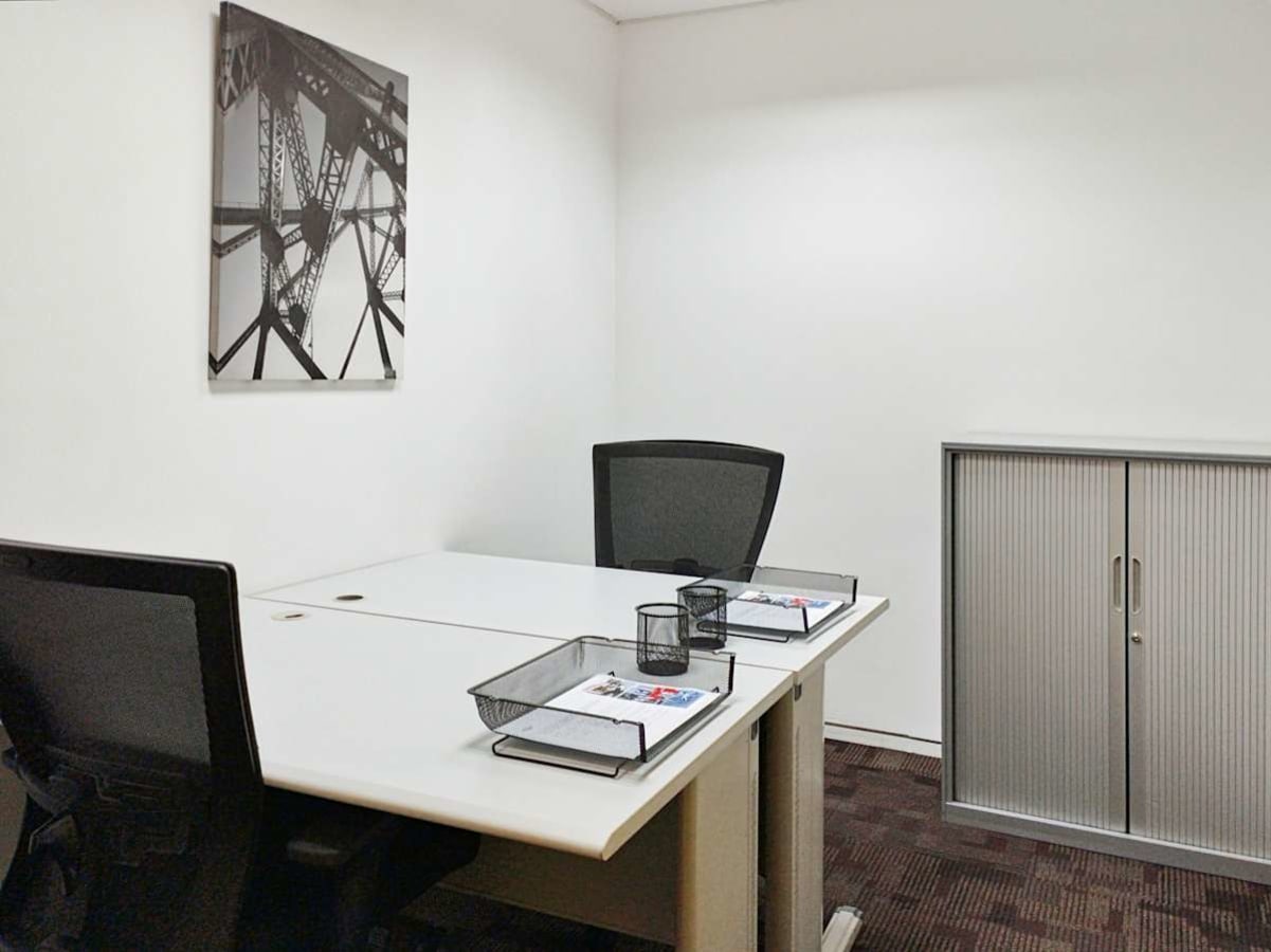 Modern coworking space with sleek desks, ergonomic chairs, and ample storage on Biliran Road.