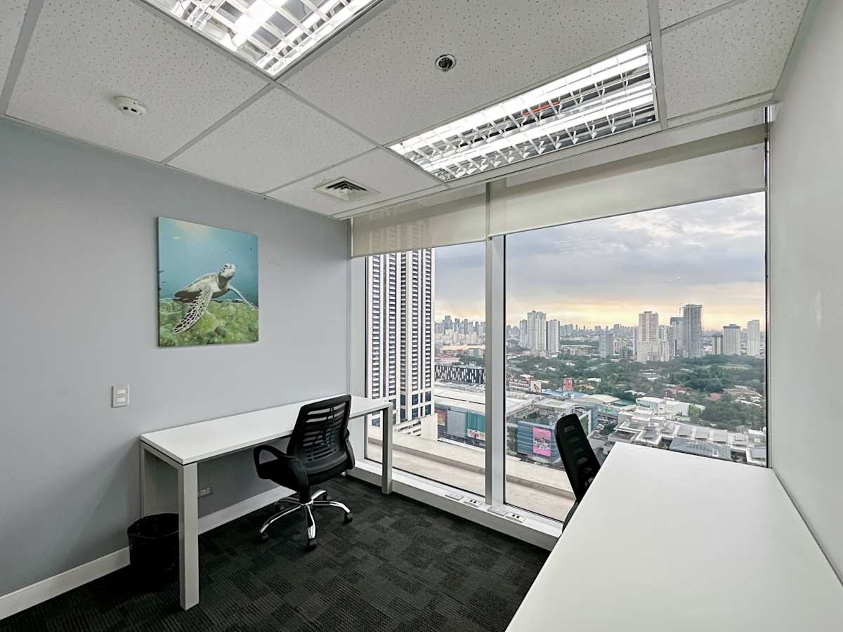Spacious private office with stunning city views and natural light. Ideal for focused work.