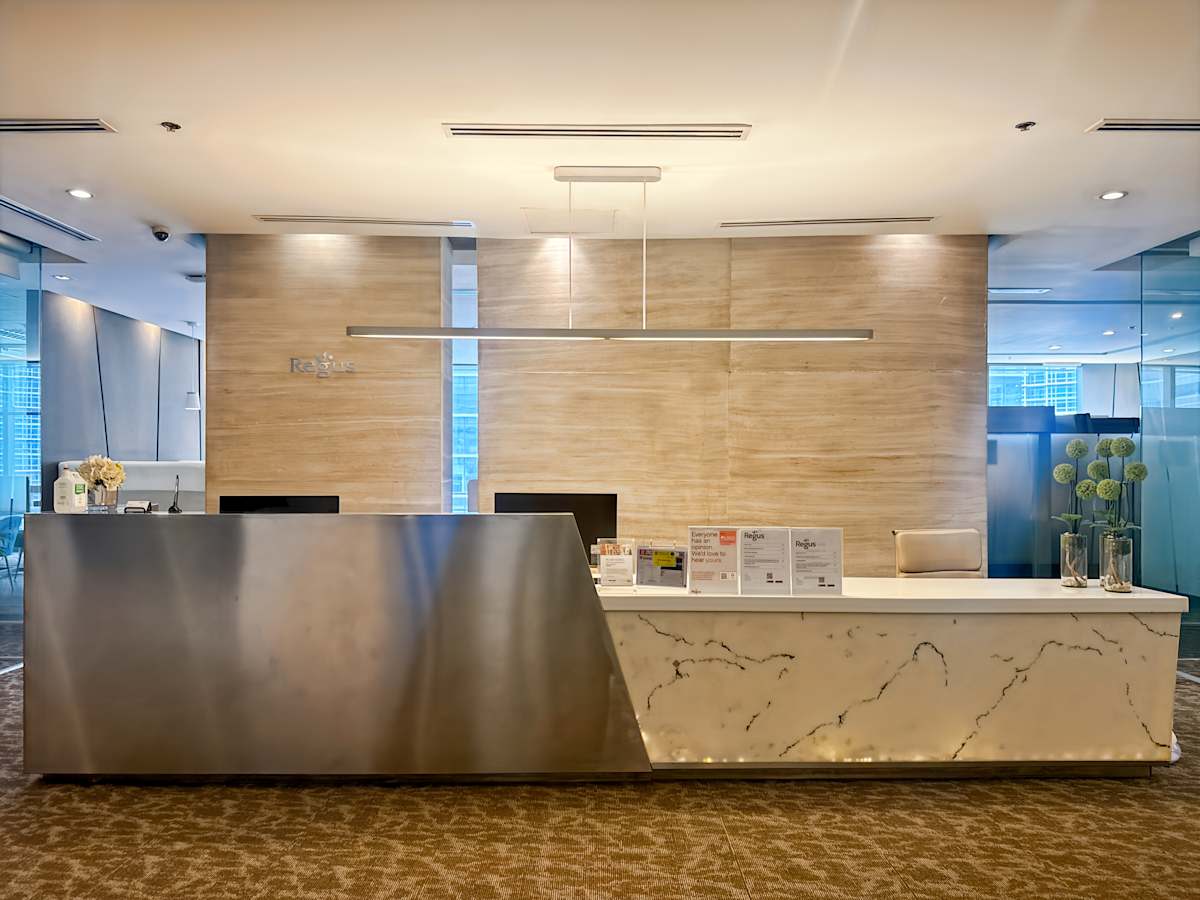 Sleek reception area with modern décor and ambient lighting, ideal for welcoming clients.