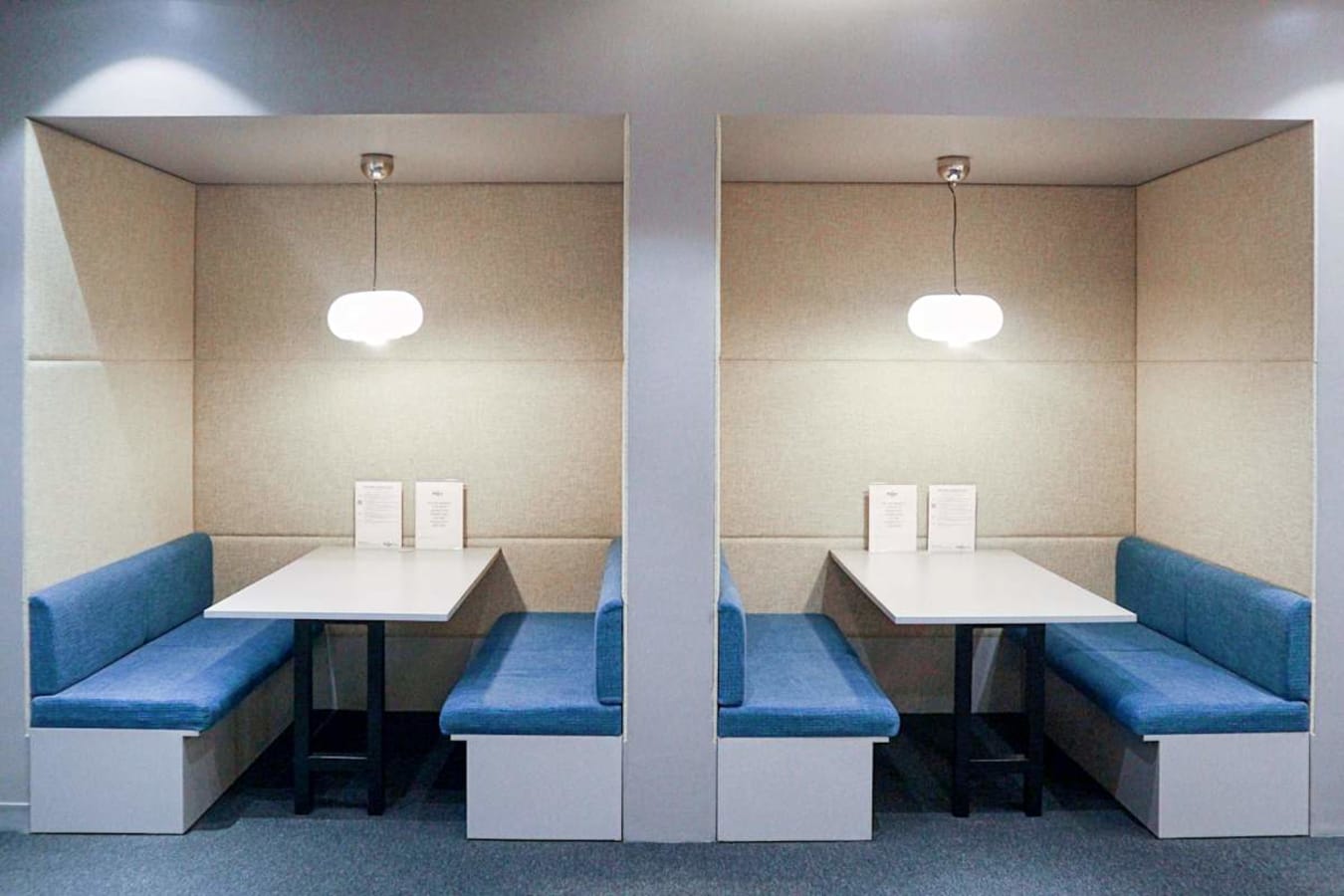 Stylish booth seating perfect for collaborative work or informal meetings.