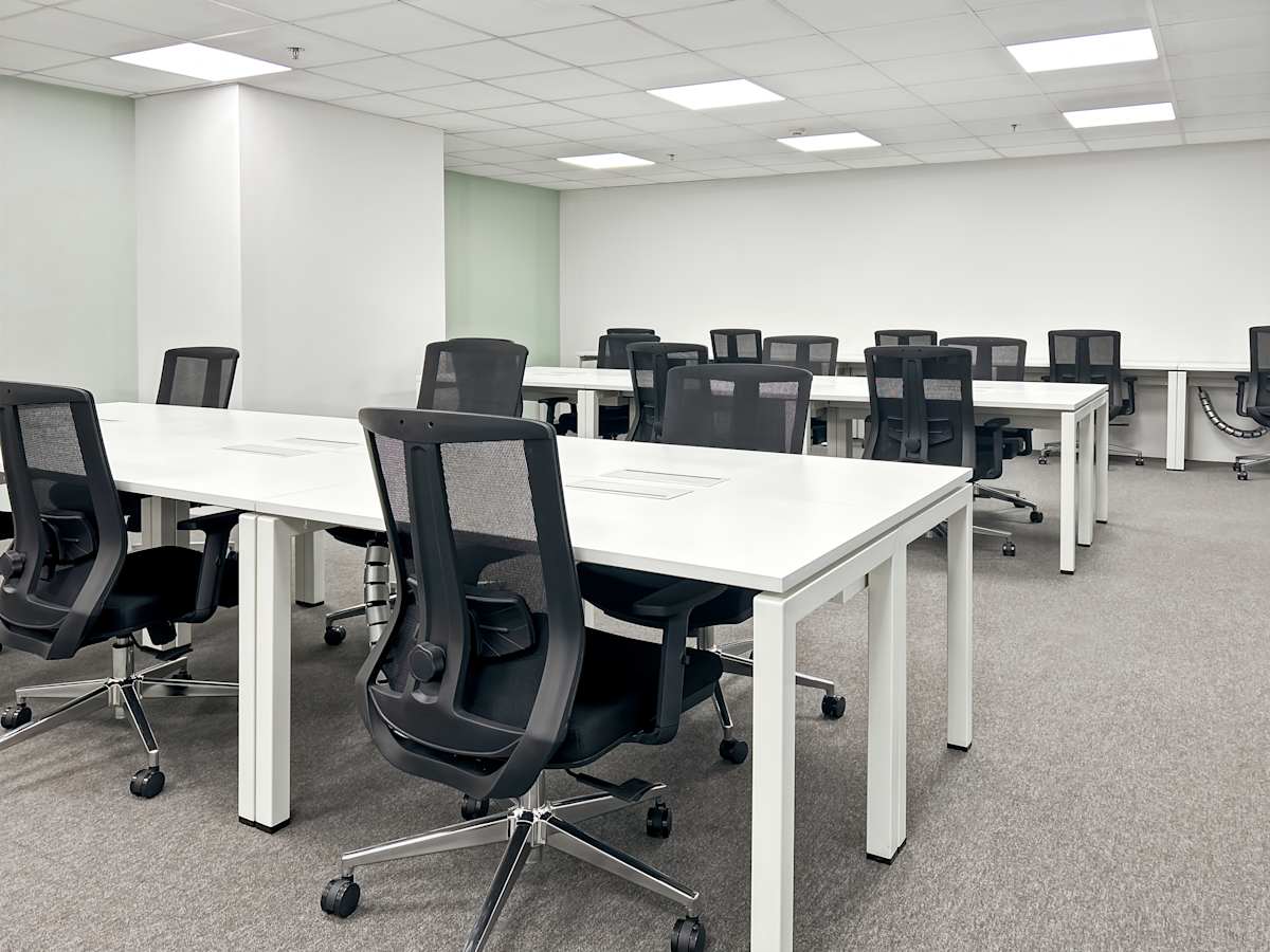 Modern coworking space with ergonomic chairs and ample lighting in Metro Manila.