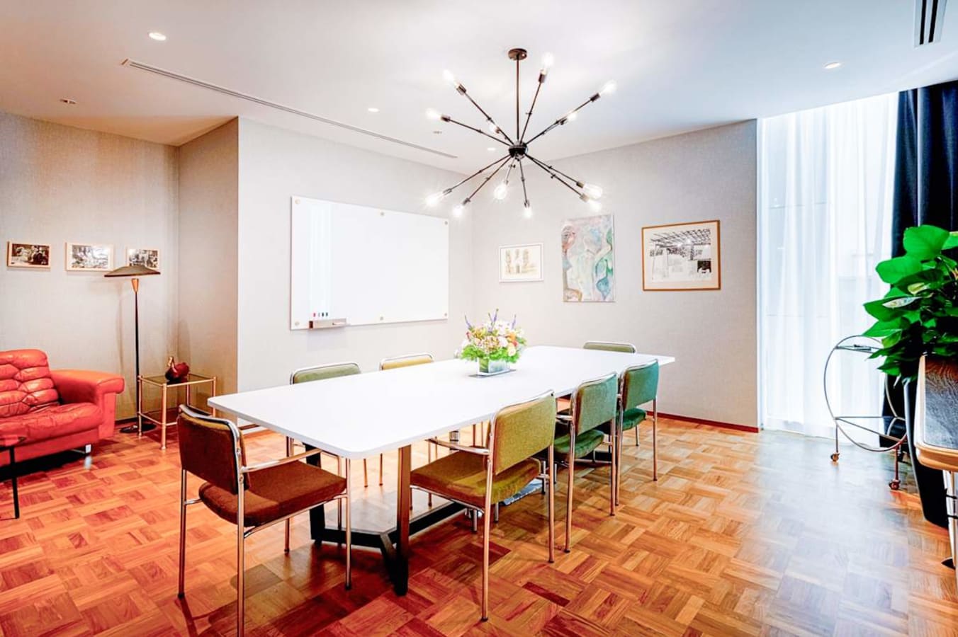 Modern coworking space with stylish seating, ample lighting, and a collaborative environment.
