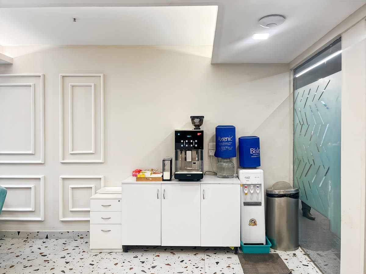 Modern coworking space with convenient coffee and water station on Noida-Greater Noida Expressway.