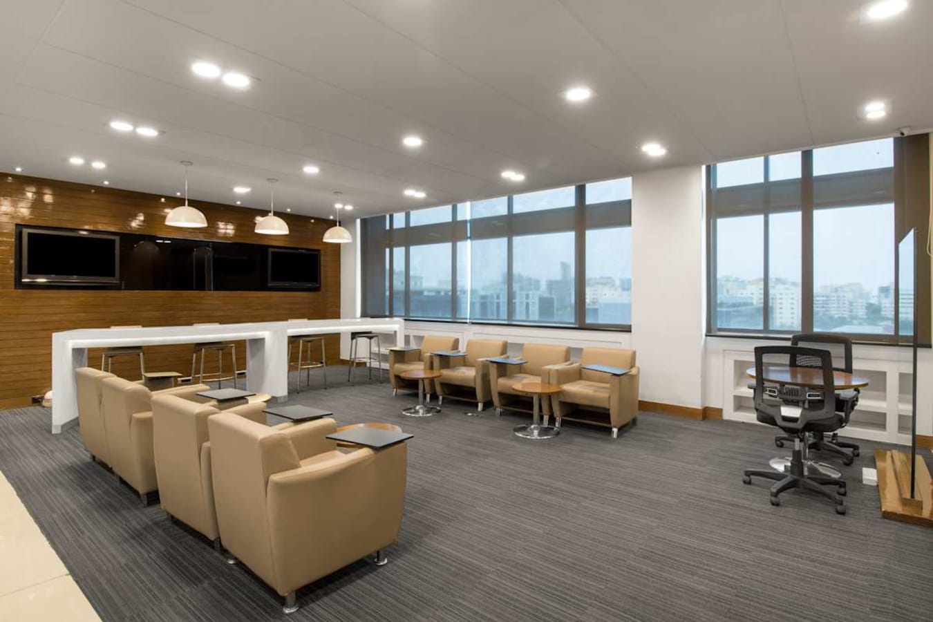 Modern coworking space in Pune with stylish seating, natural light, and collaborative zones.