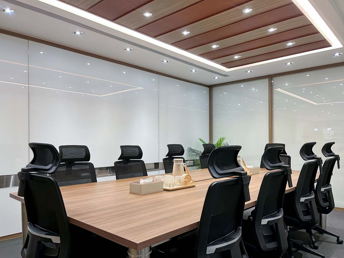 Modern coworking space with sleek seating and a spacious meeting table on Hysan Avenue.