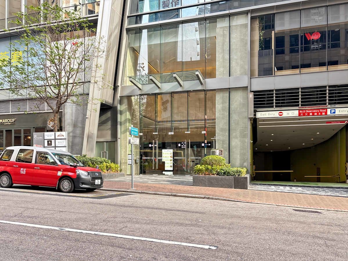 Modern coworking space on Observatory Road with sleek glass façade and convenient street access.