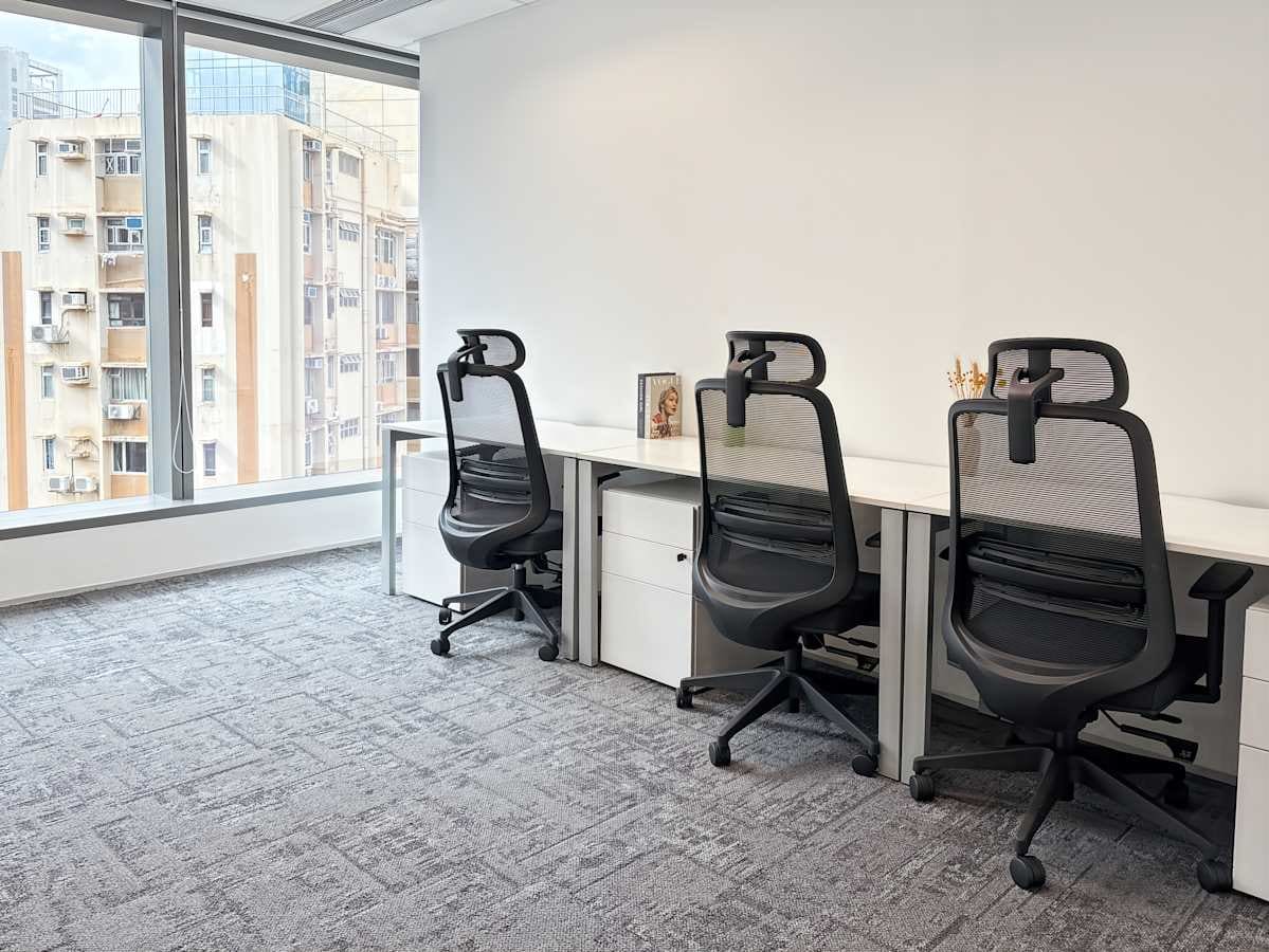 Bright coworking space with ergonomic chairs and ample natural light on Observatory Road.